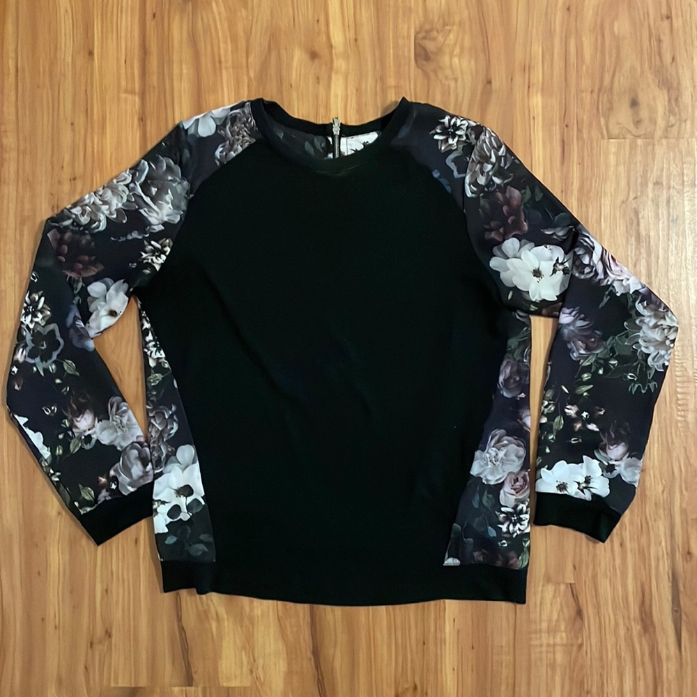 Black and floral blouse with zipper detail in back